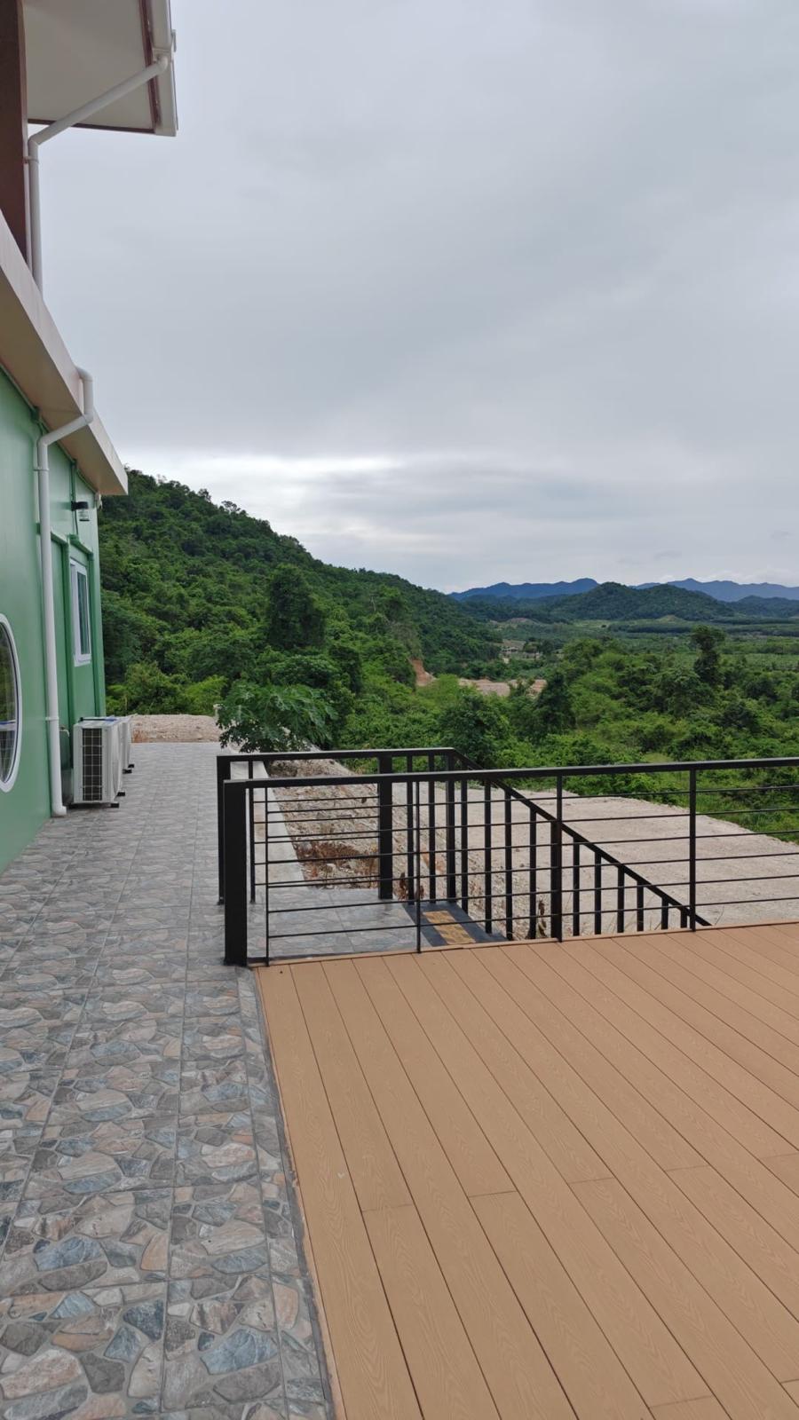 Wooden deck platform with mountain and valley view